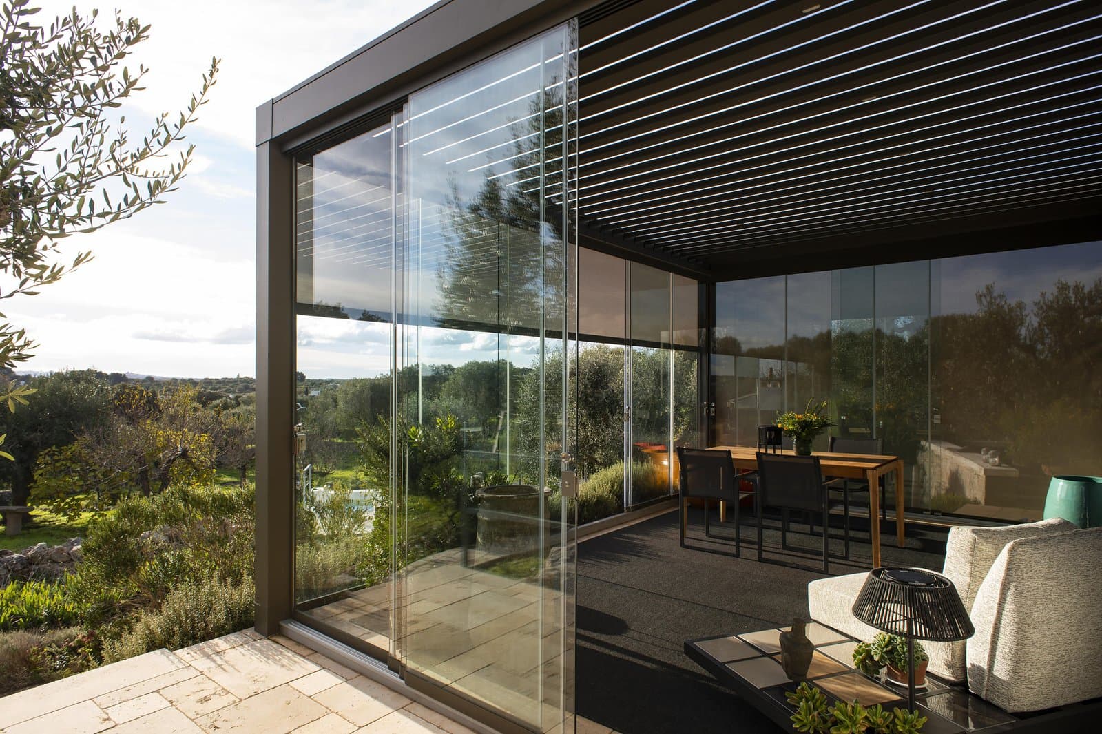 Minimalist slim sliding glass doors installed on luxury Dubai villa