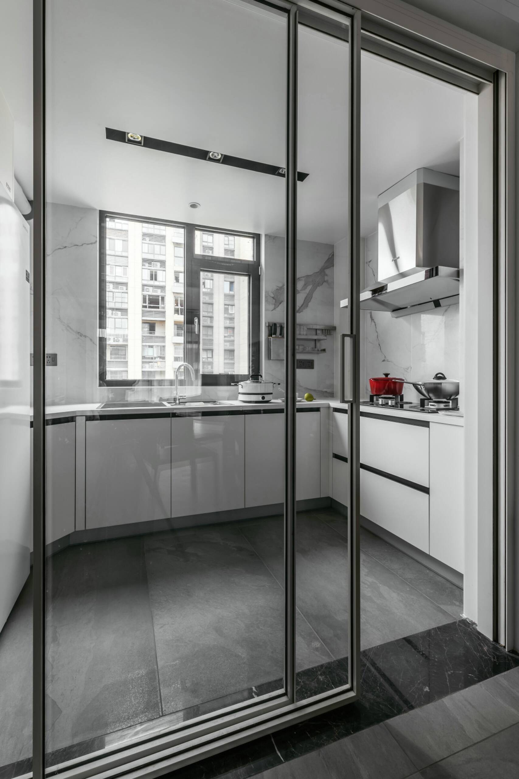 modern-kitchen-with-glass-sliding-door